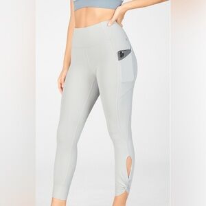 Fabletics Oasis PureLuxe High-Waisted Twist 7/8 Leggings Lavender Women’s Small